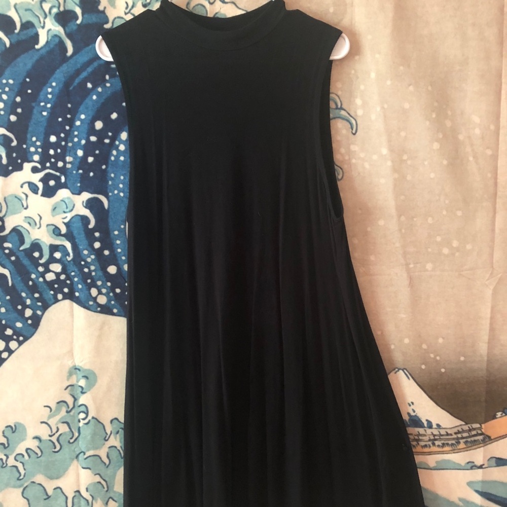 High collar, sleeveless knee length swing dress